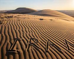 Vast golden sands of Kashan Desert under a clear blue sky